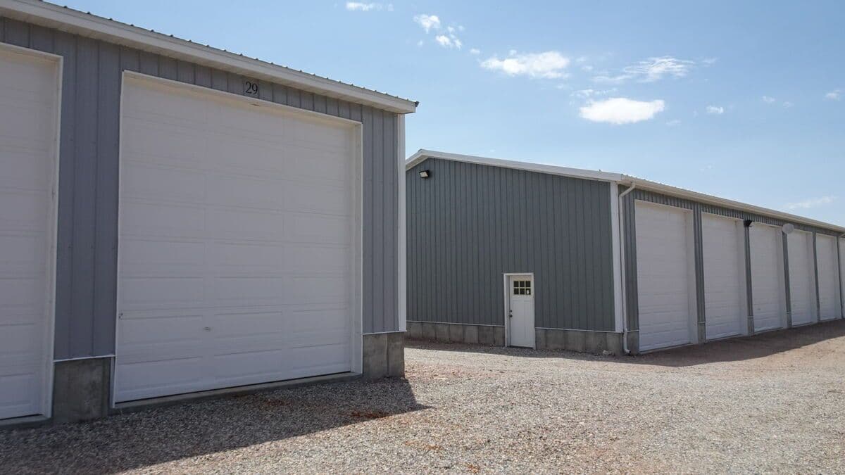 Multiple storage buildings with metal roofing at Sugar Factory Storage Complex
